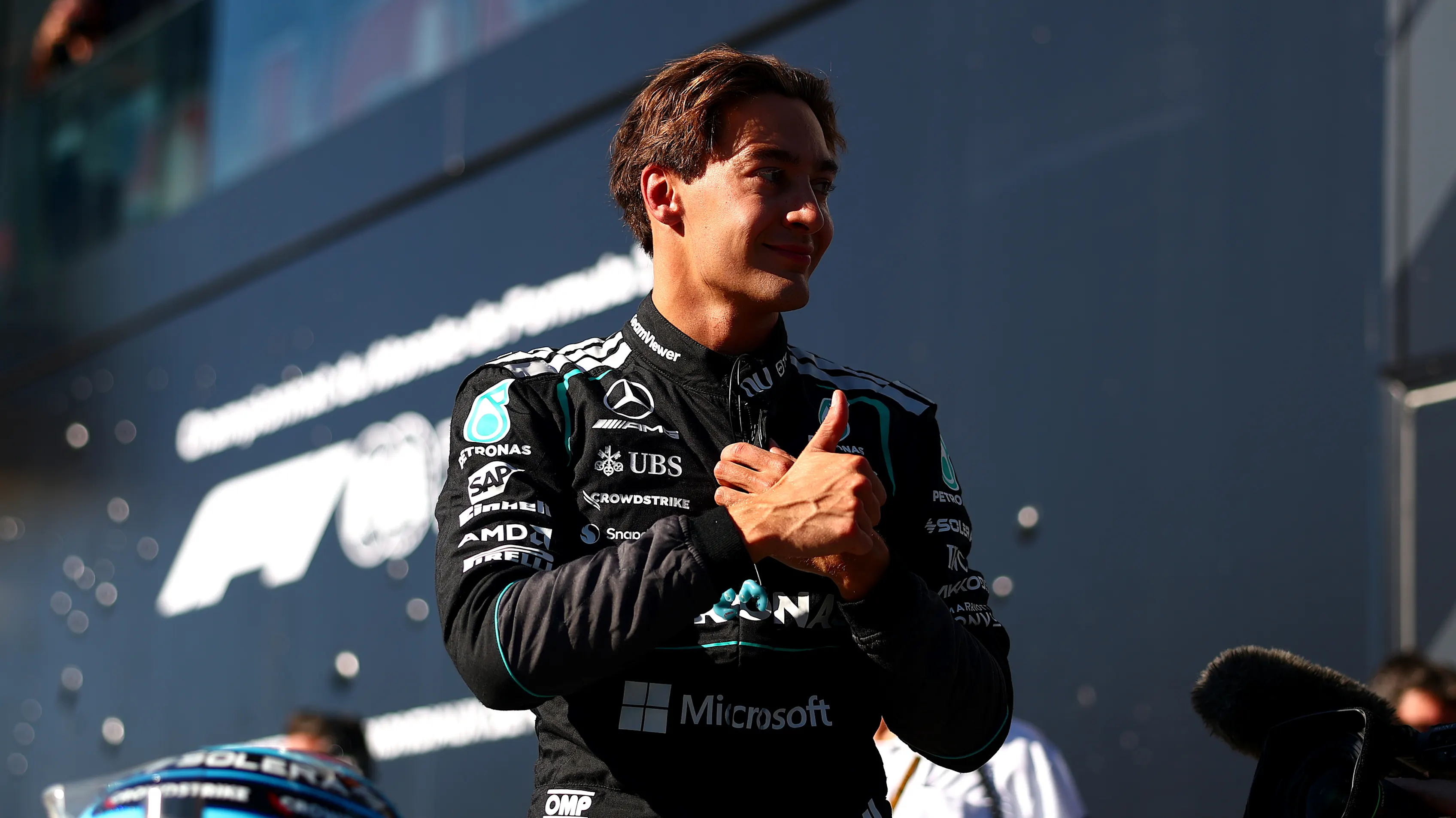 MONTREAL, QUEBEC - MAY 22: Sprint Pole qualifier George Russell of Great Britain and Mercedes AMG Petronas F1 Team celebrates in parc ferme during Sprint Qualifying ahead of the F1 Grand Prix of Canada at Circuit Gilles-Villeneuve on May 22, 2026 in Montreal, Quebec. (Photo by Bryn Lennon - Formula 1/Formula 1 via Getty Images)
