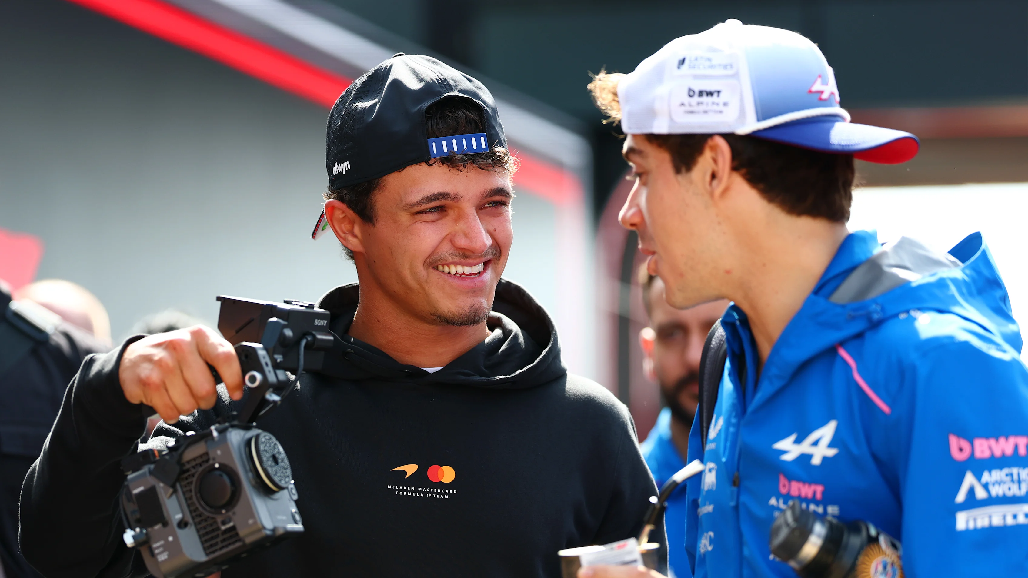 NORTHAMPTON, ENGLAND - JULY 03: Lando Norris of Great Britain and McLaren and Franco Colapinto of