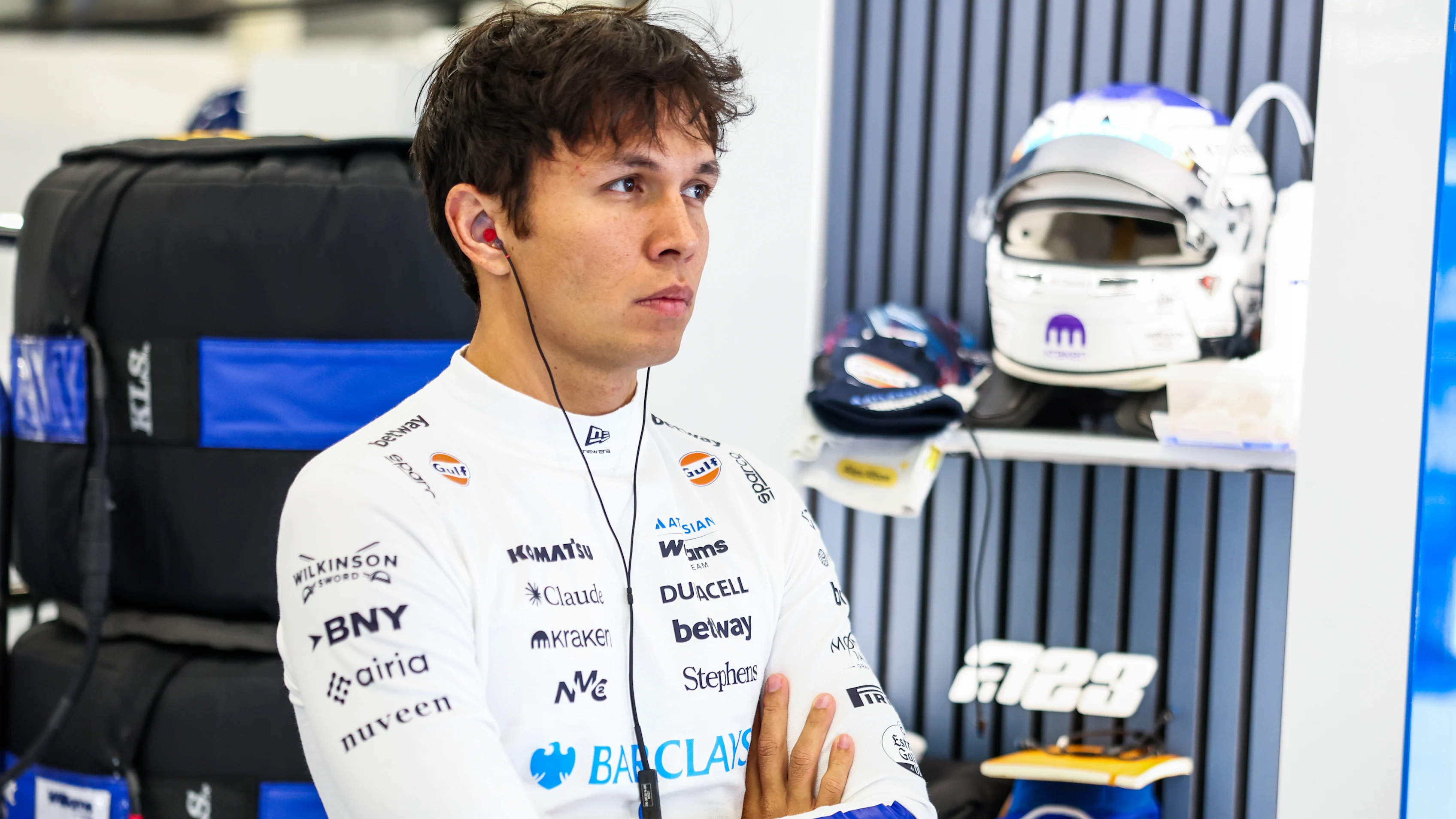 NORTHAMPTON, ENGLAND - JULY 04: Alexander Albon of Thailand and Williams looks on in the garage