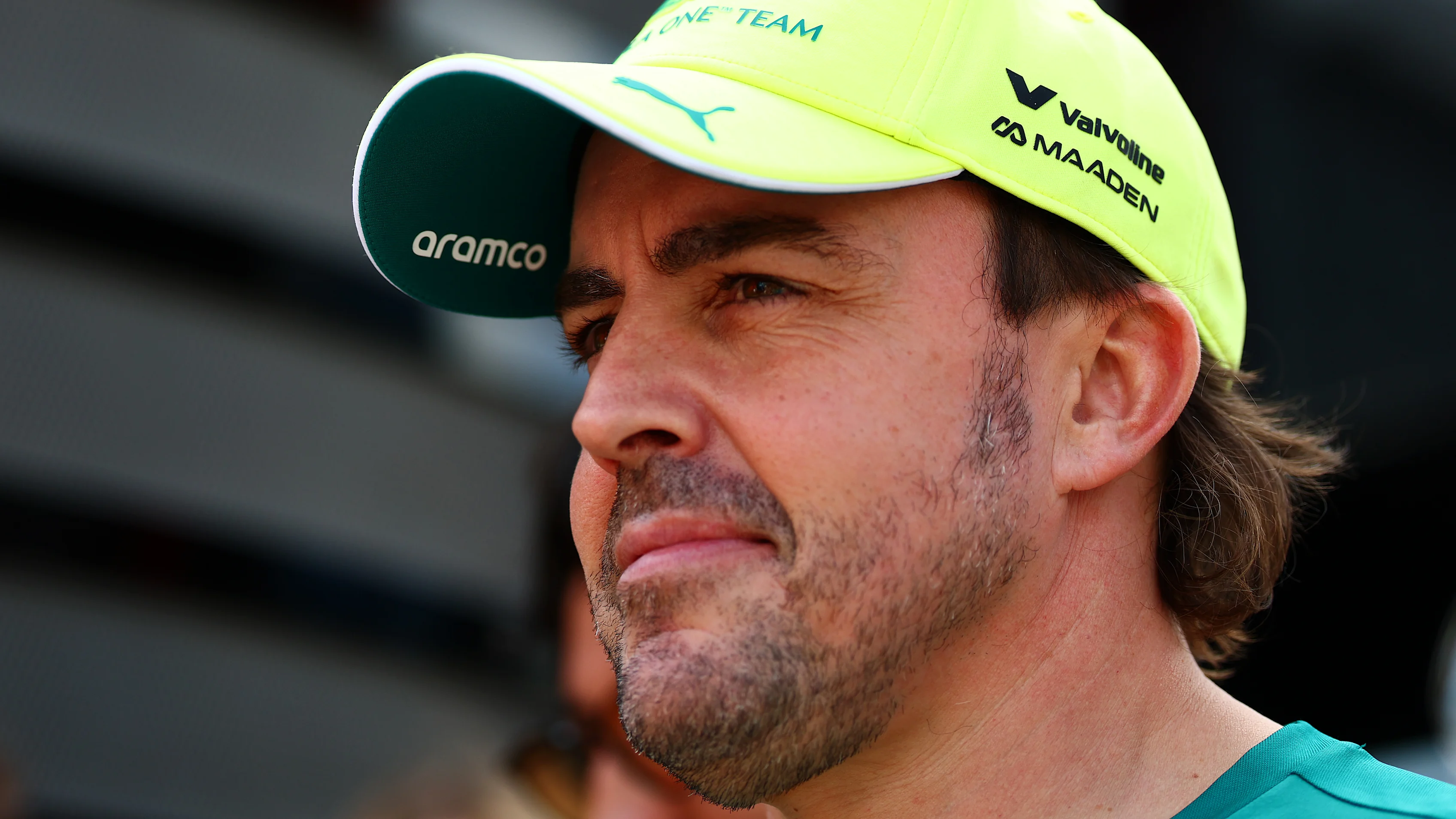 BUDAPEST, HUNGARY - JULY 23: Fernando Alonso of Spain and Aston Martin F1 Team walks in the Paddock