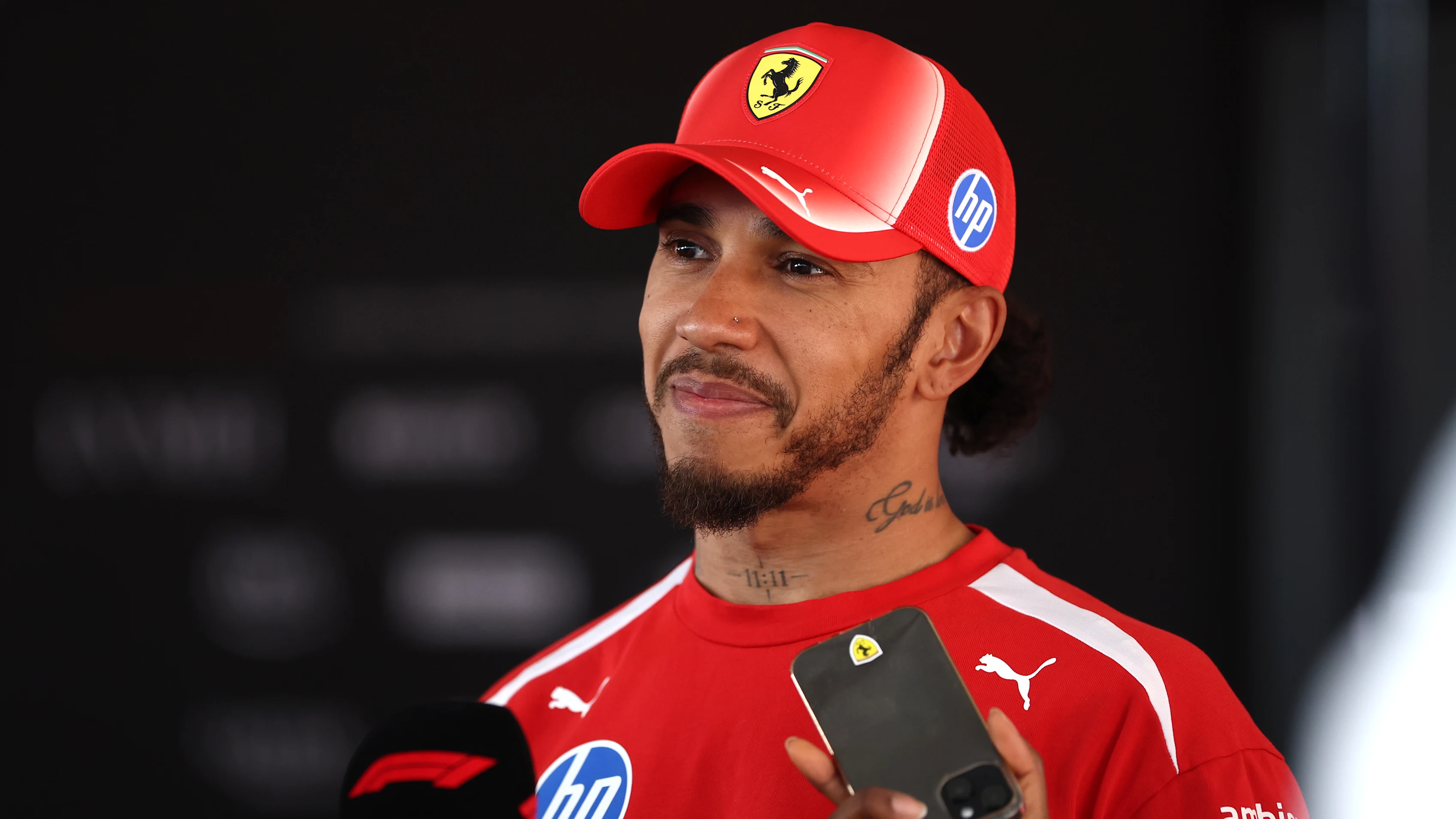 BUDAPEST, HUNGARY - JULY 25: Second placed qualifier Lewis Hamilton of Great Britain and Scuderia