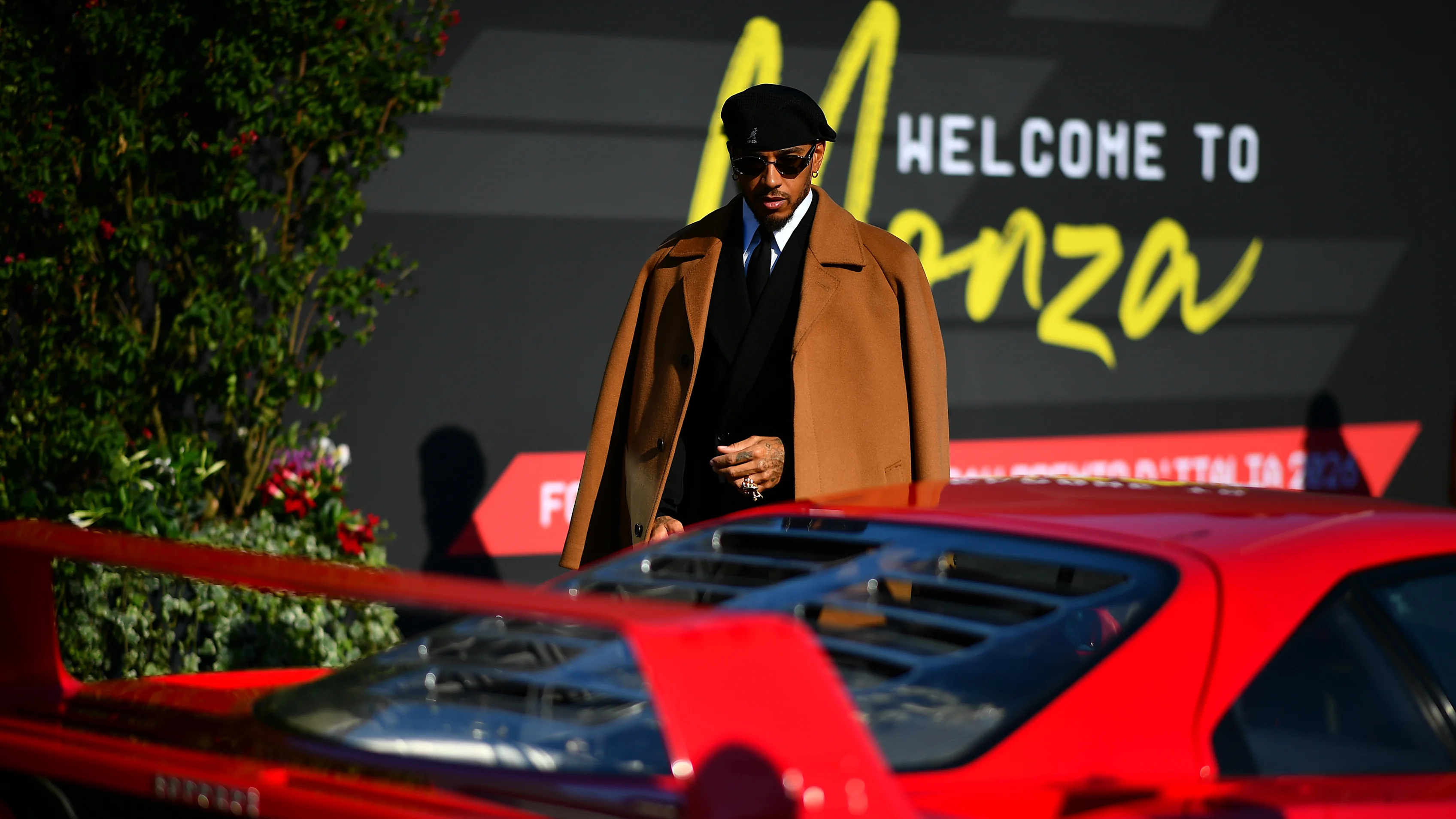MONZA, ITALY - SEPTEMBER 03: Lewis Hamilton of Great Britain and Scuderia Ferrari arrives at the