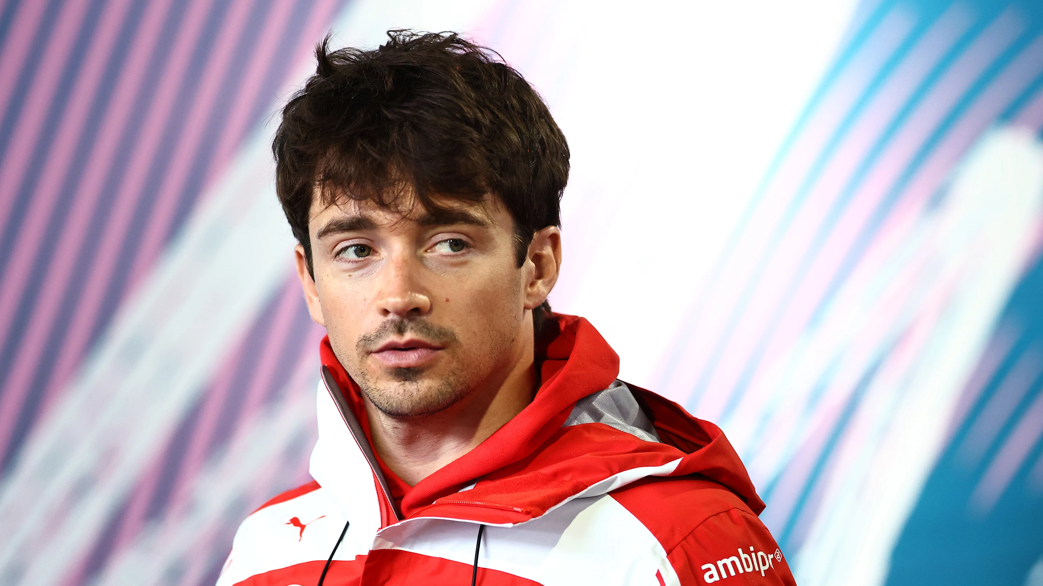 MIAMI, FLORIDA - MAY 03: Charles Leclerc of Monaco and Scuderia Ferrari arrives in the Paddock