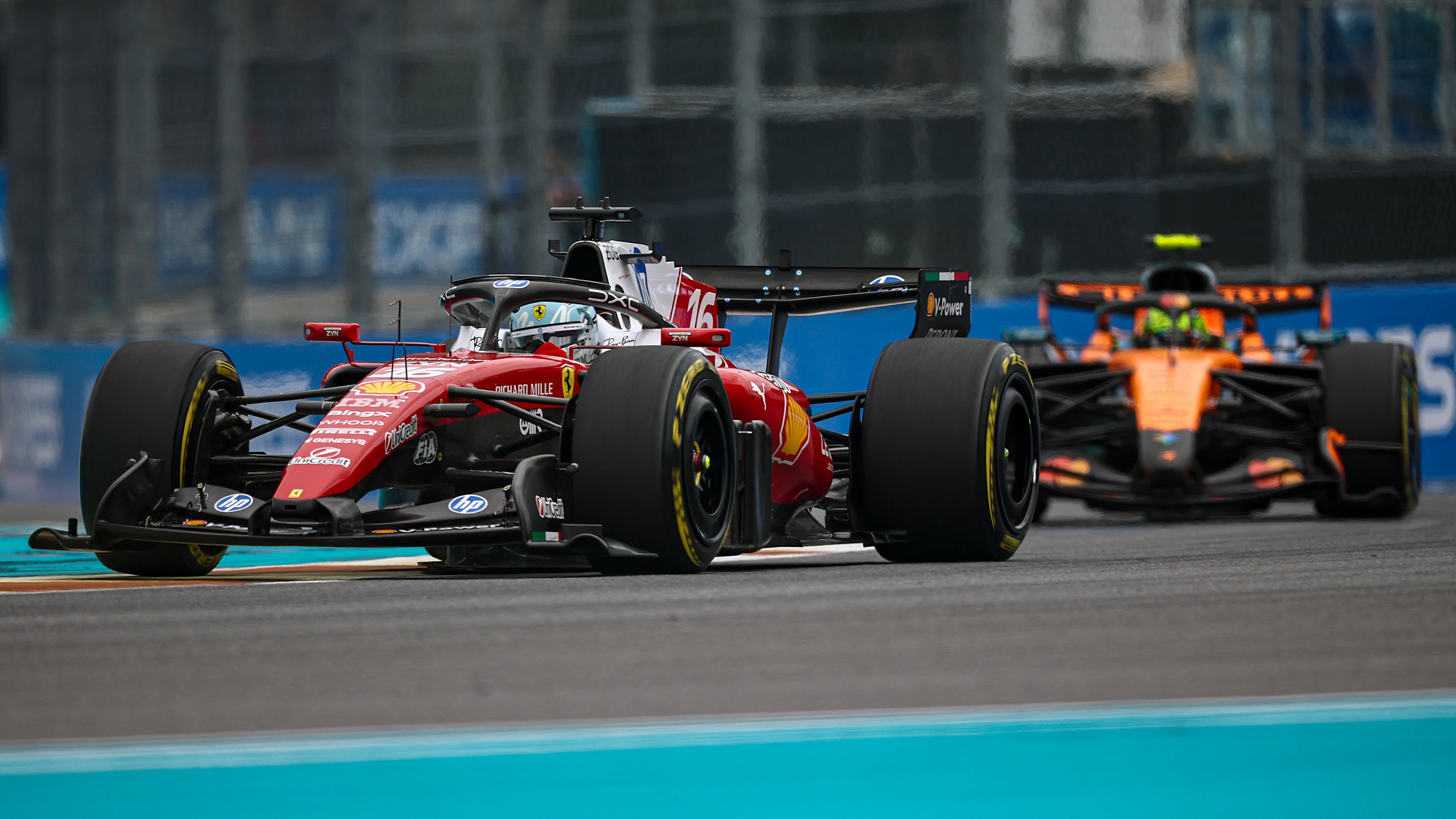 MIAMI, FLORIDA - MAY 03: Charles Leclerc of Monaco driving the (16) Scuderia Ferrari SF-26 leads Lando Norris of Great Britain driving the (1) McLaren MCL40 Mercedes on track during the F1 Grand Prix of Miami at Miami International Autodrome on May 03, 2026 in Miami, Florida. (Photo by Chris Graythen/Getty Images)