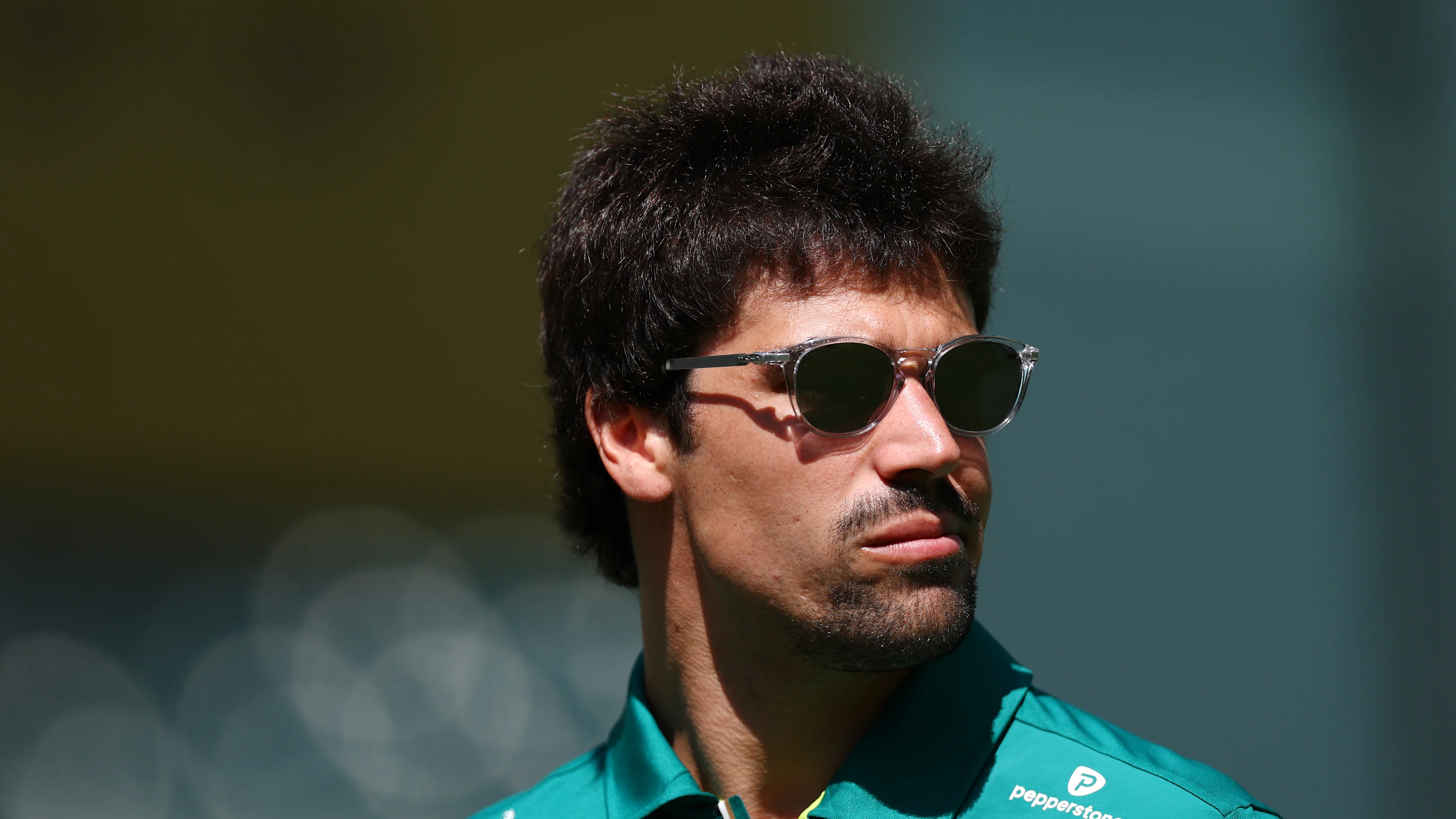 MIAMI, FLORIDA - MAY 01: Lance Stroll of Canada and Aston Martin F1 Team arrives in the Paddock