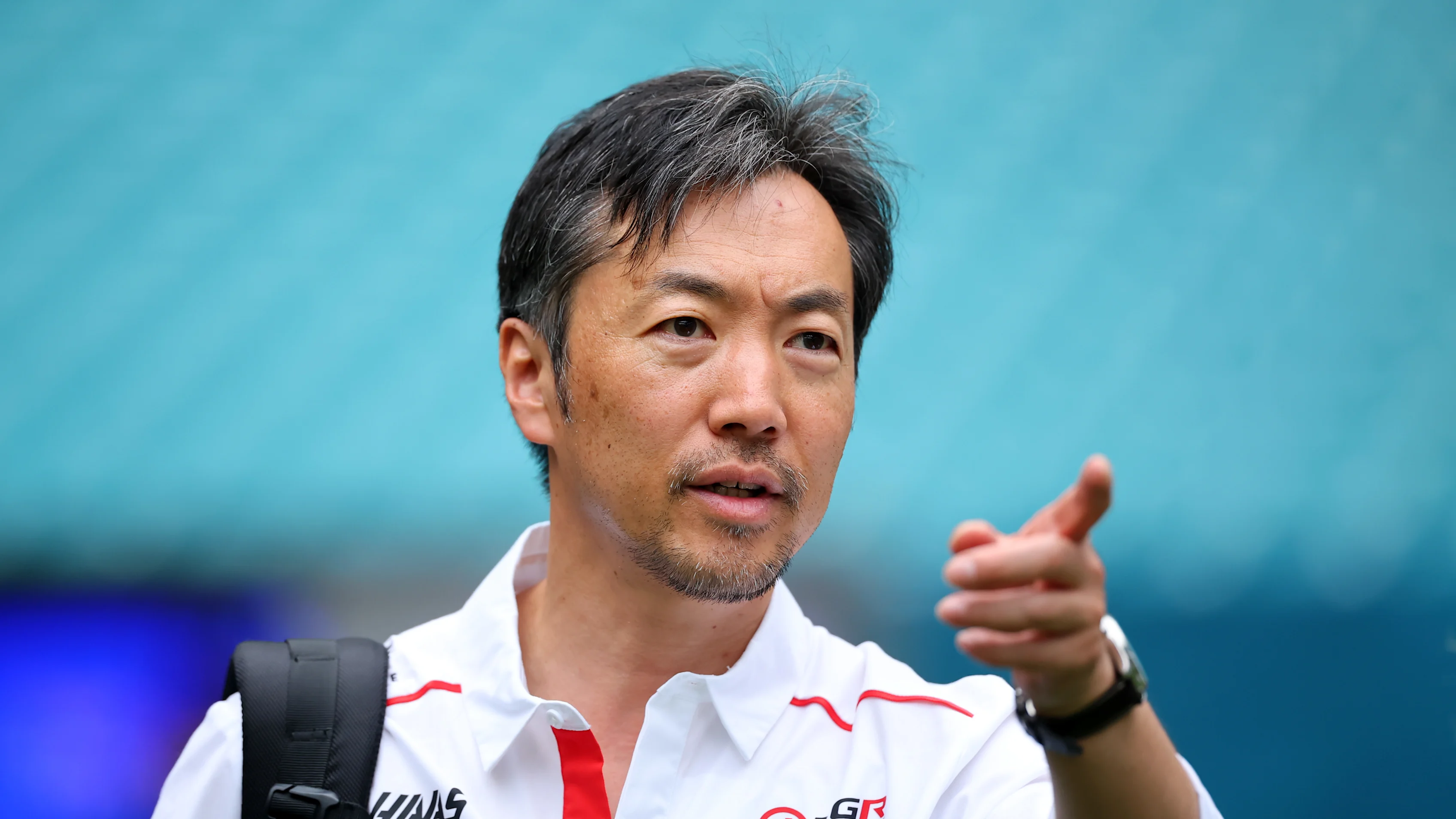 MIAMI, FLORIDA - APRIL 30: Ayao Komatsu, Team Principal of Haas F1 arrives in the Paddock during