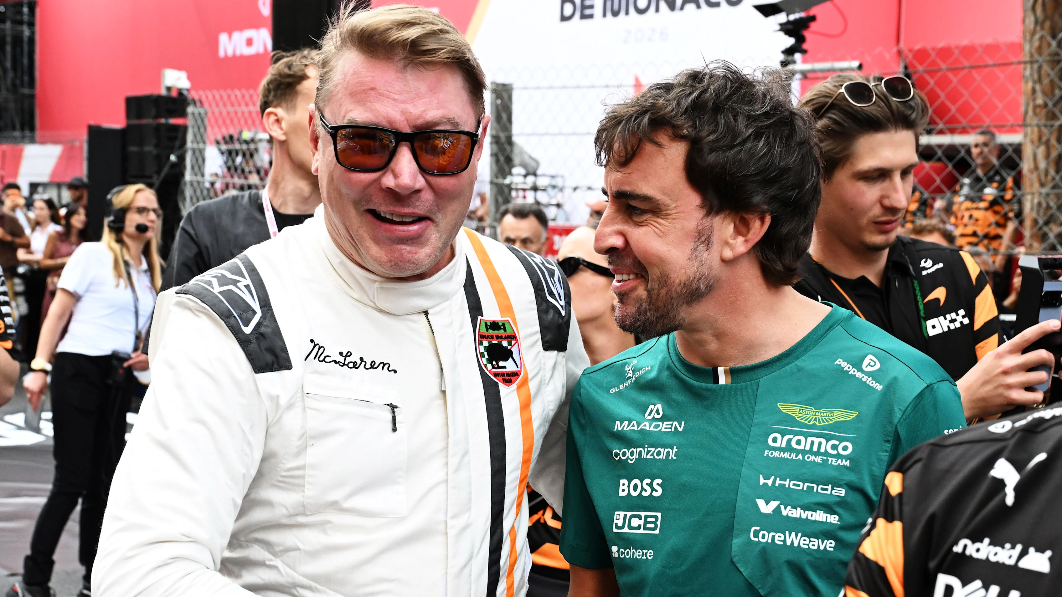 MONTE-CARLO, MONACO - JUNE 04: Mika Hakkinen and Fernando Alonso of Spain and Aston Martin F1 Team