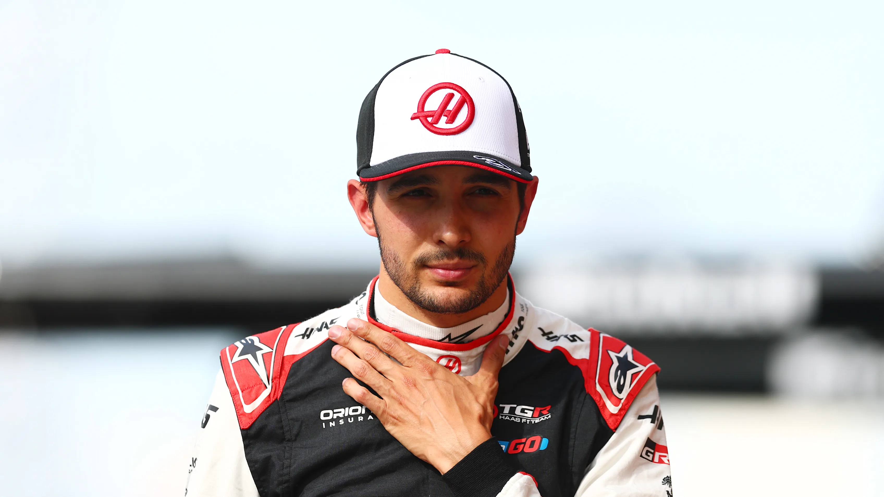 ZANDVOORT, NETHERLANDS - AUGUST 21: Esteban Ocon of France and Haas F1 looks on in the Pitlane