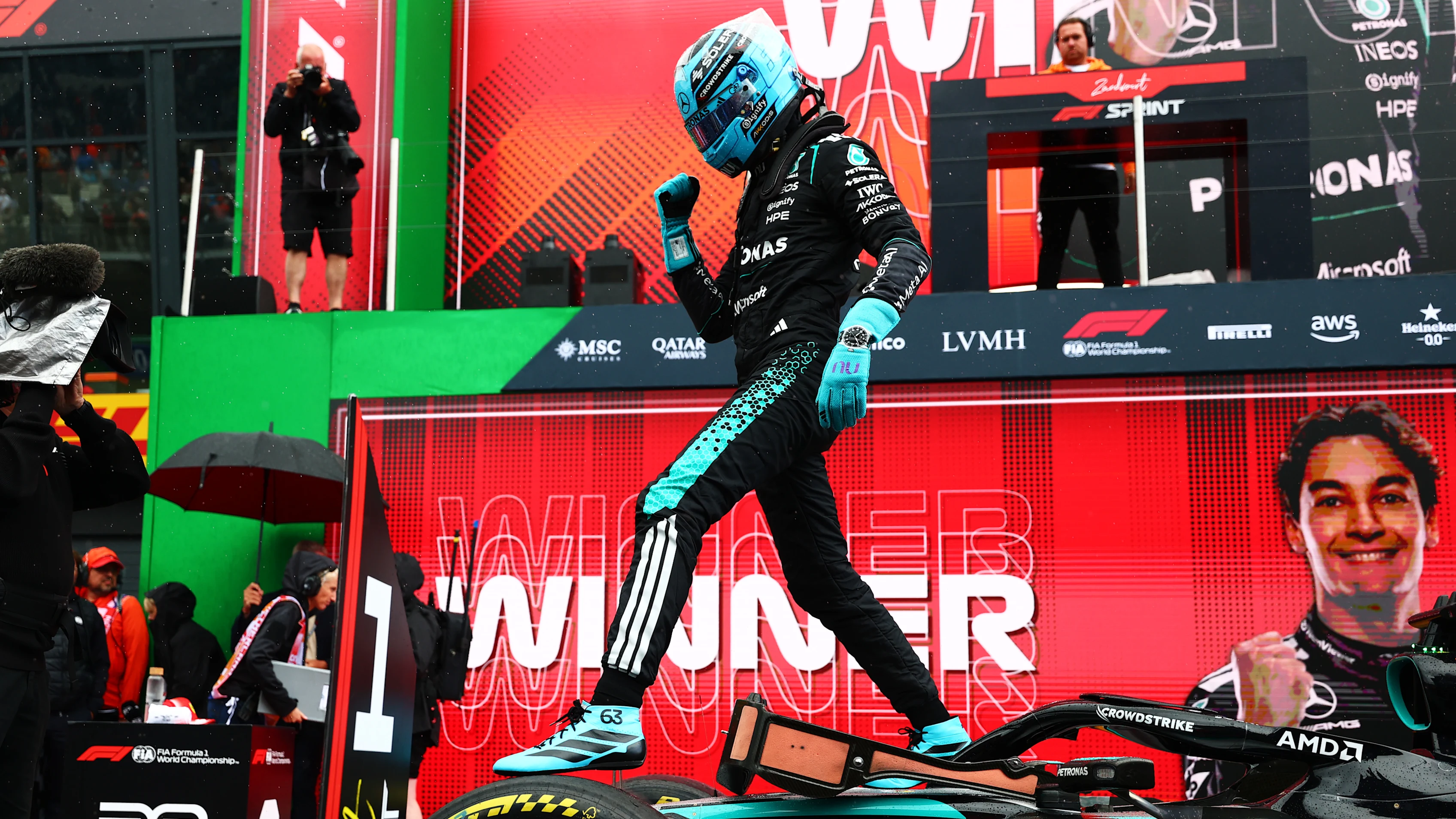 ZANDVOORT, NETHERLANDS - AUGUST 22: Sprint winner George Russell of Great Britain and Mercedes AMG