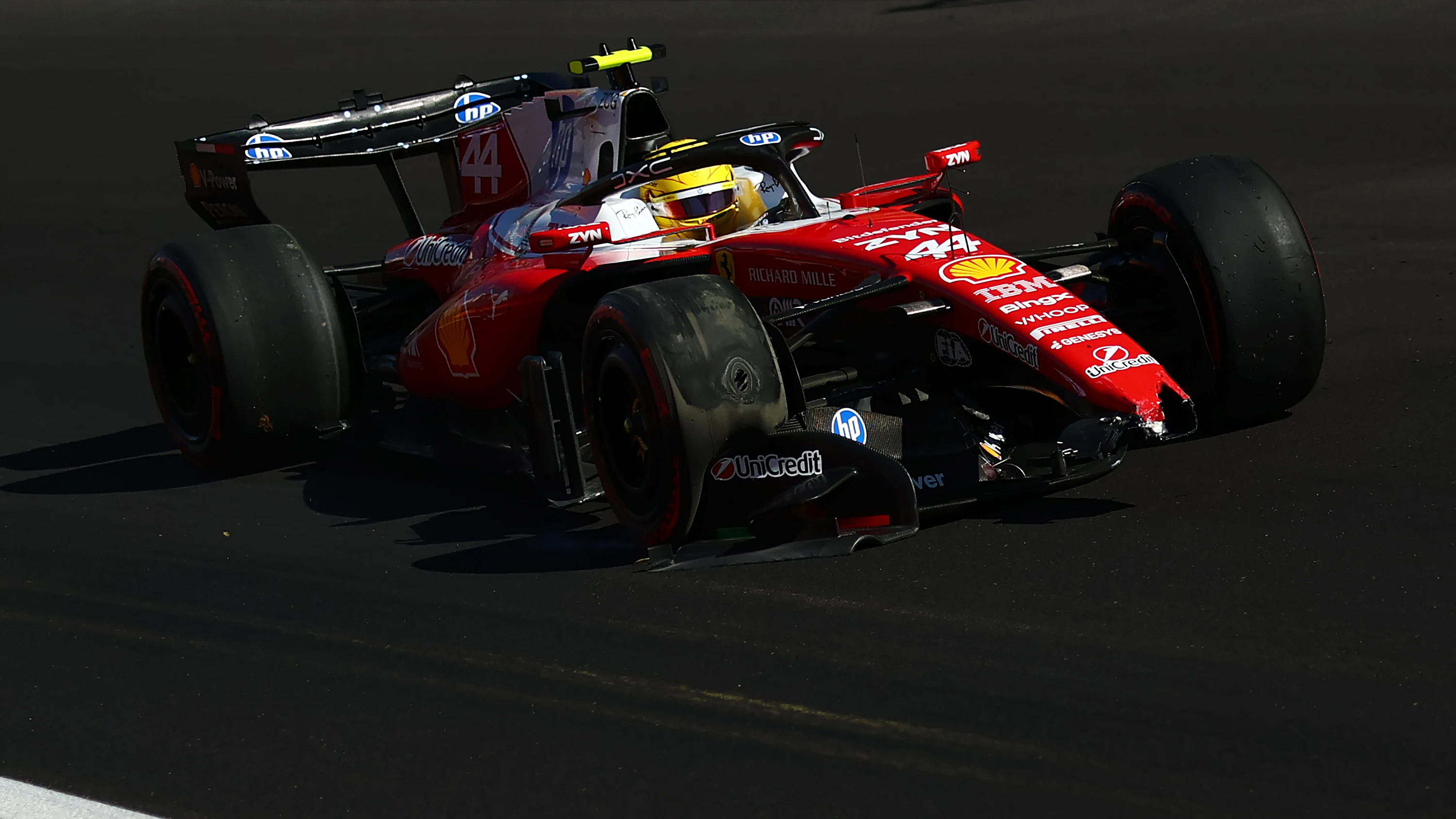 MADRID, SPAIN - SEPTEMBER 12: Lewis Hamilton of Great Britain driving the (44) Scuderia Ferrari