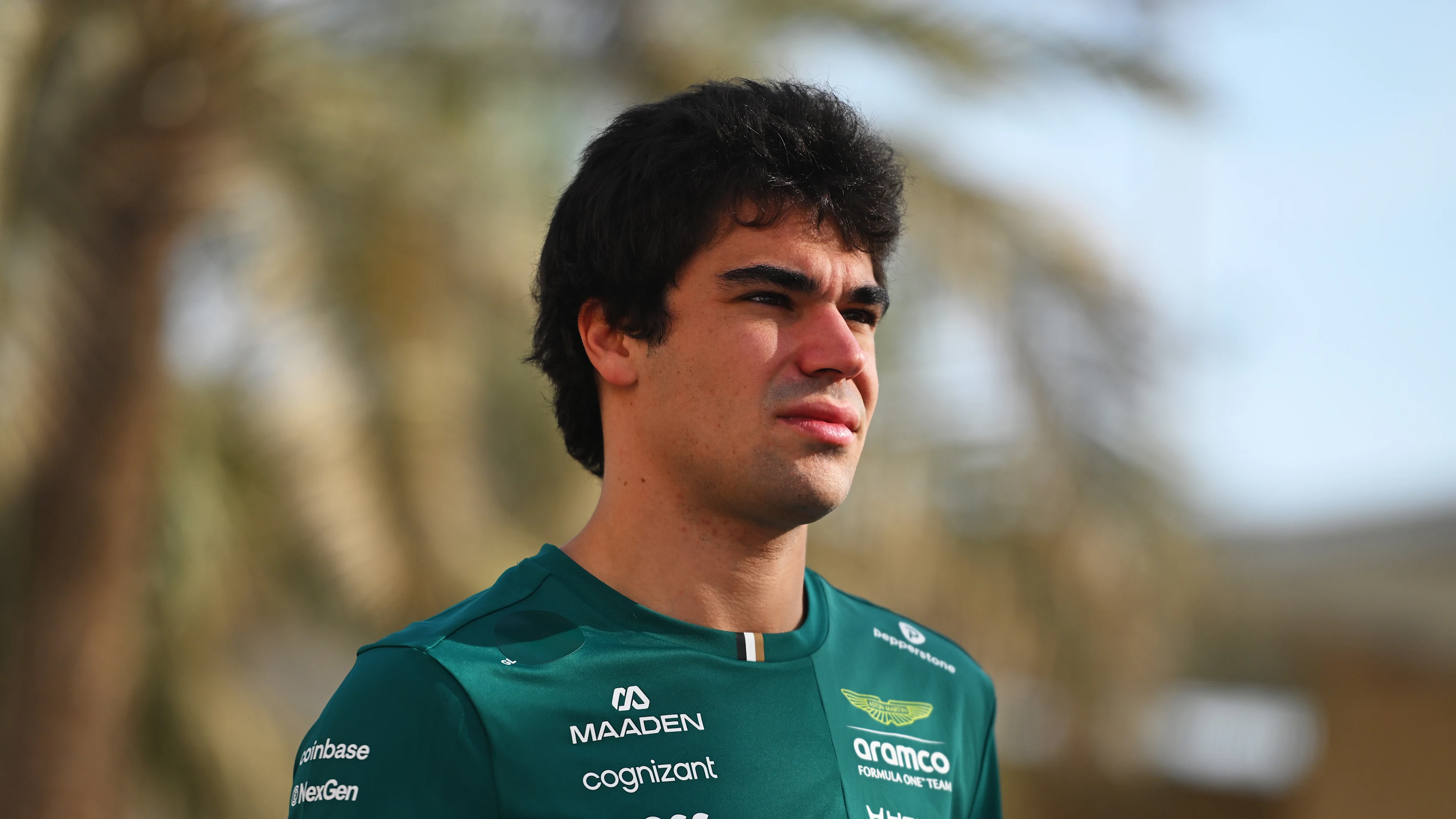BAHRAIN, BAHRAIN - FEBRUARY 11: Lance Stroll of Canada and Aston Martin F1 Team walks in the
