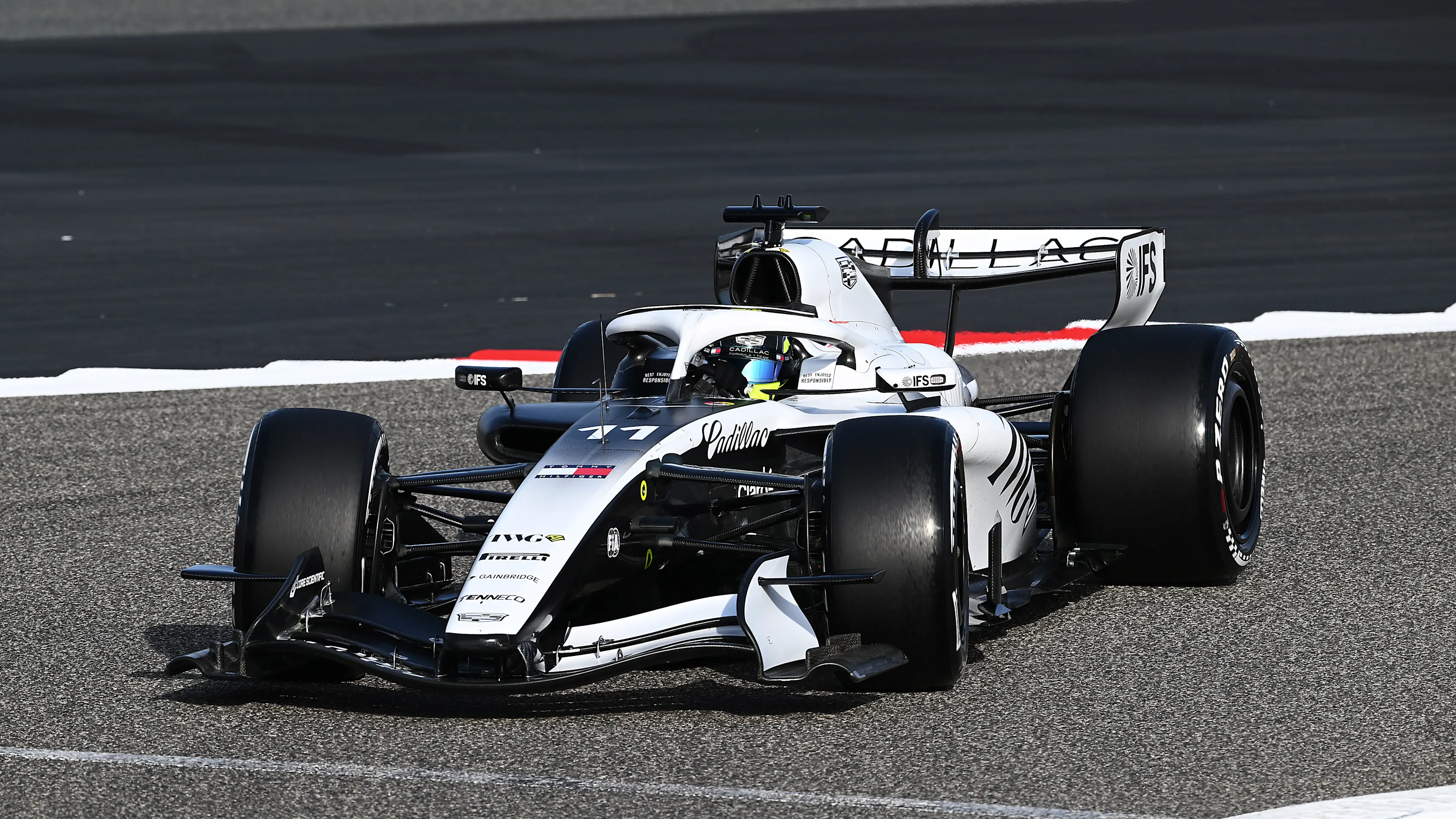 BAHRAIN, BAHRAIN - FEBRUARY 11: Sergio Perez of Mexico driving the (11) Cadillac F1 Team Ferrari on