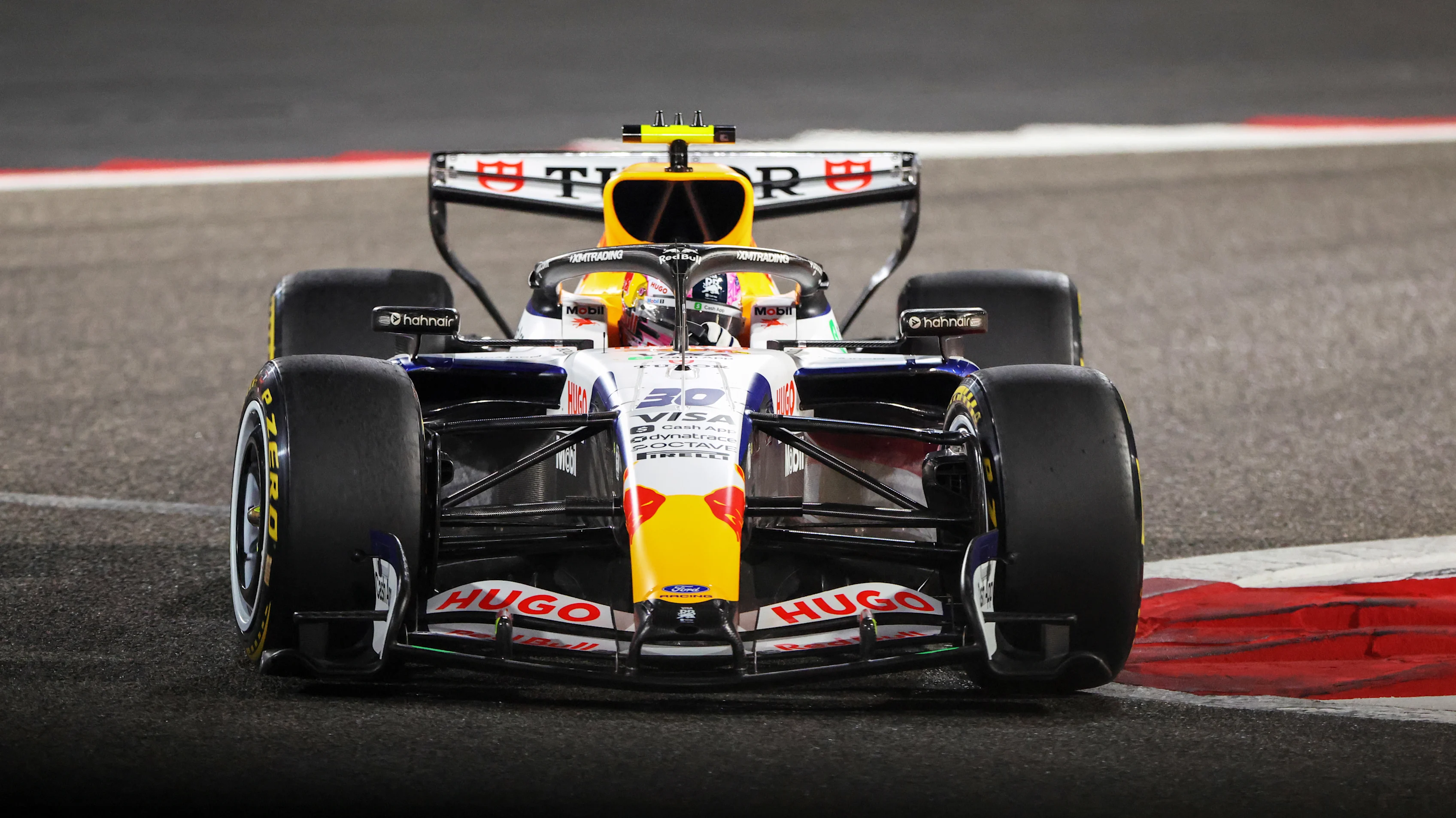 BAHRAIN, BAHRAIN - FEBRUARY 18: Liam Lawson of New Zealand driving the (30) Visa Cash App Racing