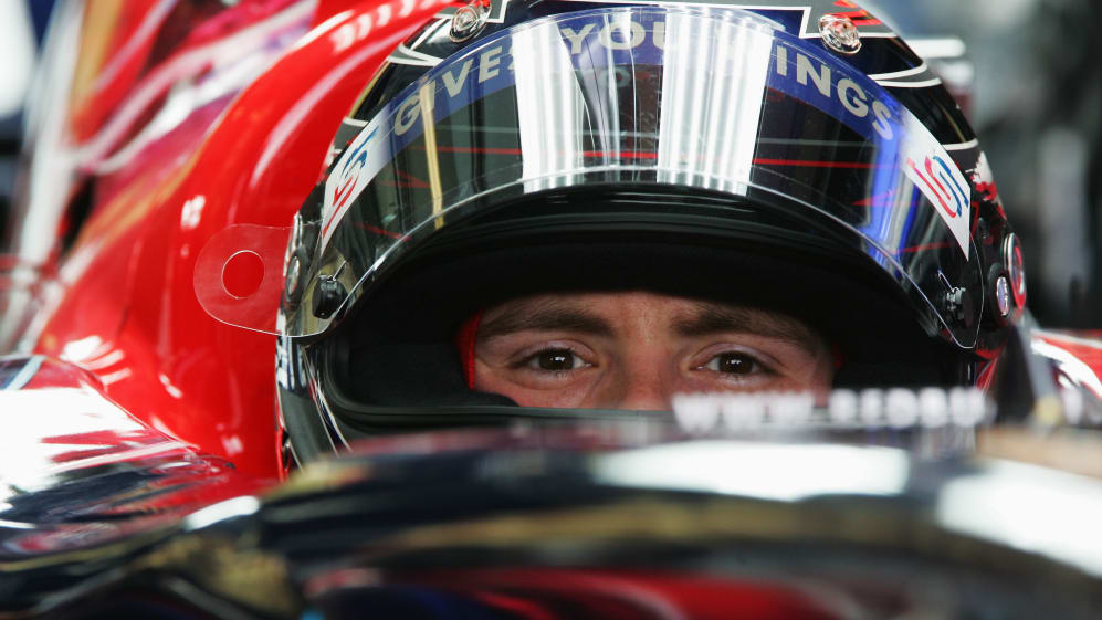 MELBOURNE, AUSTRALIA - MARCH 16: Scott Speed of the USA and Toro Rosso sits in his car during