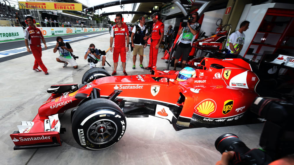 Ferrari's Spanish driver Fernando Alonso leaves the pits at the Interlagos racetrack in Sao Paulo,