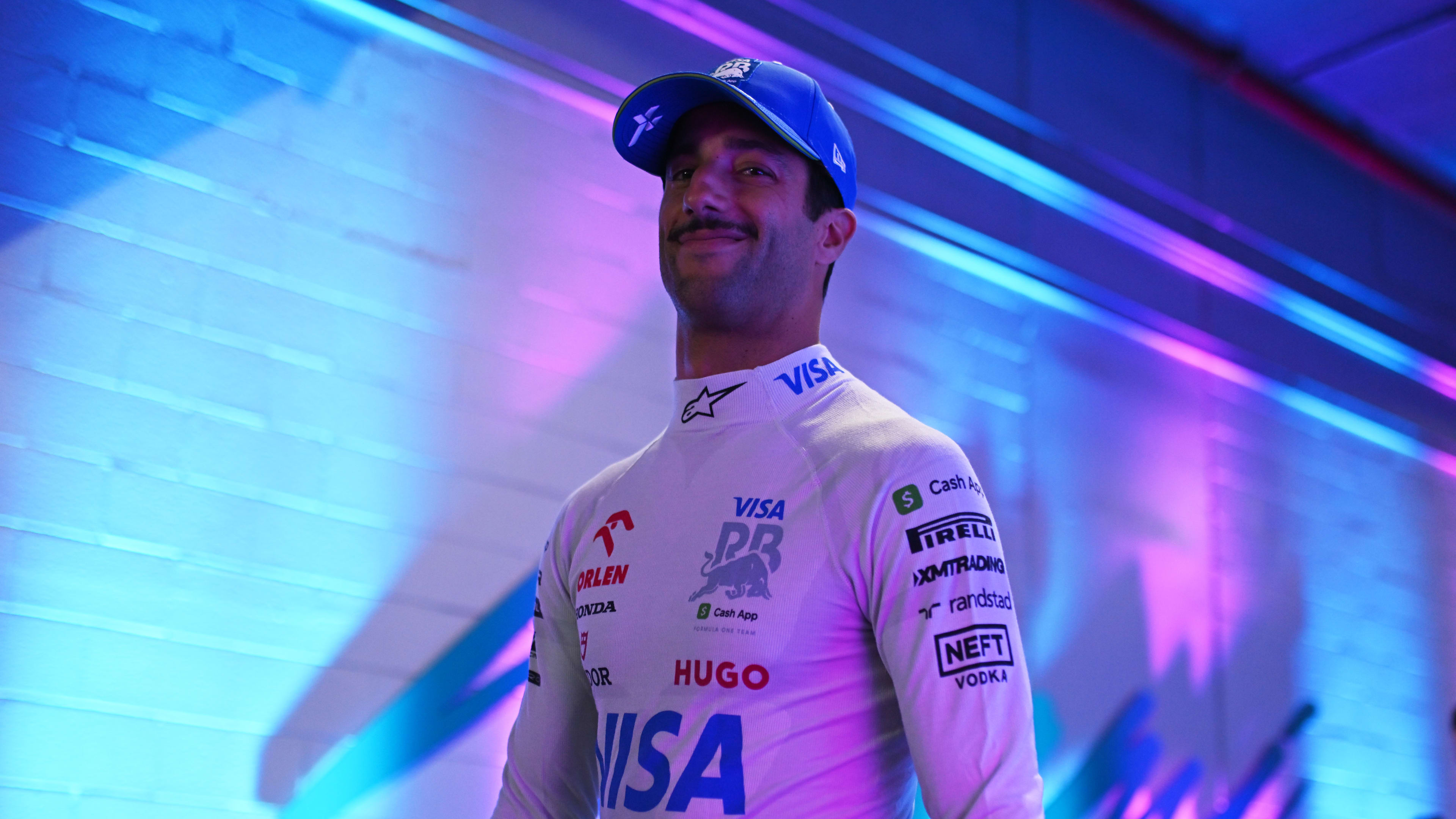MIAMI, FLORIDA - MAY 03: Daniel Ricciardo of Australia and Visa Cash App RB walks to the garage