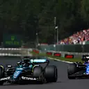 SPA, BELGIUM - JULY 28: Lance Stroll of Canada driving the (18) Aston Martin AMR24 Mercedes leads Logan Sargeant of United States driving the (2) Williams FW46 Mercedes during the F1 Grand Prix of Belgium at Circuit de Spa-Francorchamps on July 28, 2024 in Spa, Belgium. (Photo by Joe Portlock - Formula 1/Formula 1 via Getty Images)