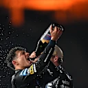 After listening to his national anthem, Norris unleashed the champagne