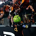 Norris ran over to his McLaren team on the pit wall to thank them for their efforts