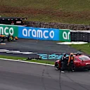 SAO PAULO, BRAZIL - NOVEMBER 08: The FIA Medical car assists Oscar Piastri of Australia and McLaren and Franco Colapinto of Argentina and Alpine F1 after a crash during the Sprint ahead of the F1 Grand Prix of Brazil at Autodromo Jose Carlos Pace on November 08, 2025 in Sao Paulo, Brazil. (Photo by Mark Thompson/Getty Images)