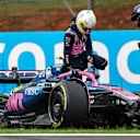 SAO PAULO, BRAZIL - NOVEMBER 08: Franco Colapinto of Argentina and Alpine F1 is assisted after a crash during the Sprint ahead of the F1 Grand Prix of Brazil at Autodromo Jose Carlos Pace on November 08, 2025 in Sao Paulo, Brazil. (Photo by Peter Fox/Getty Images)