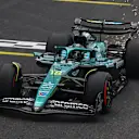 SAO PAULO, BRAZIL - NOVEMBER 08: Sparks fly behind Lance Stroll of Canada driving the (18) Aston Martin F1 Team AMR25 Mercedes on track during qualifying ahead of the F1 Grand Prix of Brazil at Autodromo Jose Carlos Pace on November 08, 2025 in Sao Paulo, Brazil. (Photo by Mark Sutton - Formula 1/Formula 1 via Getty Images)
