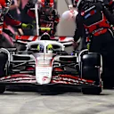 LUSAIL CITY, QATAR - NOVEMBER 30: Oliver Bearman of Great Britain driving the (87) Haas F1 VF-25 Ferrari makes a pitstop during the F1 Grand Prix of Qatar at Lusail International Circuit on November 30, 2025 in Lusail City, Qatar. (Photo by Peter Fox/Getty Images)