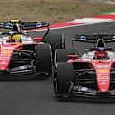 SHANGHAI, CHINA - MARCH 15: Charles Leclerc of Monaco driving the (16) Scuderia Ferrari SF-26 leads Lewis Hamilton of Great Britain driving the (44) Scuderia Ferrari SF-26 on track during the F1 Grand Prix of China at Shanghai International Circuit on March 15, 2026 in Shanghai, China. (Photo by Rudy Carezzevoli/Getty Images)