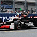 MIAMI, FLORIDA - MAY 04: Oliver Bearman of Great Britain and Haas F1 and Esteban Ocon of France and
