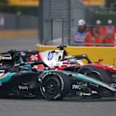 MIAMI, FLORIDA - MAY 03: Charles Leclerc of Monaco driving the (16) Scuderia Ferrari SF-26 and George Russell of Great Britain driving the (63) Mercedes AMG Petronas F1 Team W17 battle for track position during the F1 Grand Prix of Miami at Miami International Autodrome on May 03, 2026 in Miami, Florida. (Photo by Andy Hone/LAT Images)