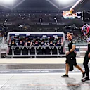 ABU DHABI, UNITED ARAB EMIRATES - DECEMBER 07: 20th placed qualifier Jack Doohan of Australia and Alpine F1 walks in the Pitlane during qualifying ahead of the F1 Grand Prix of Abu Dhabi at Yas Marina Circuit on December 07, 2024 in Abu Dhabi, United Arab Emirates. (Photo by Mark Thompson/Getty Images)