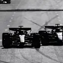 BAKU, AZERBAIJAN - SEPTEMBER 15: Sergio Perez of Mexico driving the (11) Oracle Red Bull Racing RB20 and Charles Leclerc of Monaco driving the (16) Ferrari SF-24 battle for track position during the F1 Grand Prix of Azerbaijan at Baku City Circuit on September 15, 2024 in Baku, Azerbaijan. (Photo by Joe Portlock - Formula 1/Formula 1 via Getty Images)