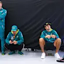 SPA, BELGIUM - JULY 28: Fernando Alonso of Spain and Aston Martin F1 Team, Lance Stroll of Canada and Aston Martin F1 Team and Esteban Ocon of France and Alpine F1 interact during the drivers parade prior to the F1 Grand Prix of Belgium at Circuit de Spa-Francorchamps on July 28, 2024 in Spa, Belgium. (Photo by Bryn Lennon - Formula 1/Formula 1 via Getty Images)