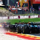 SPA, BELGIUM - JULY 28: A rear view of the start as Lando Norris of Great Britain driving the (4) McLaren MCL38 Mercedes runs wide during the F1 Grand Prix of Belgium at Circuit de Spa-Francorchamps on July 28, 2024 in Spa, Belgium. (Photo by Mark Thompson/Getty Images)