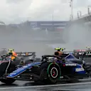 MONTREAL, QUEBEC - JUNE 09: Logan Sargeant of United States driving the (2) Williams FW46 Mercedes leads Sergio Perez of Mexico driving the (11) Oracle Red Bull Racing RB20 on track during the F1 Grand Prix of Canada at Circuit Gilles Villeneuve on June 09, 2024 in Montreal, Quebec. (Photo by Chris Graythen/Getty Images)