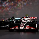 MONTREAL, QUEBEC - JUNE 09: Nico Hulkenberg of Germany driving the (27) Haas F1 VF-24 Ferrari leads Lance Stroll of Canada driving the (18) Aston Martin AMR24 Mercedes on track during the F1 Grand Prix of Canada at Circuit Gilles Villeneuve on June 09, 2024 in Montreal, Quebec. (Photo by Jared C. Tilton - Formula 1/Formula 1 via Getty Images)