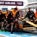 NORTHAMPTON, ENGLAND - JULY 05: The car of Oscar Piastri of Australia and McLaren is pushed in the Pitlane during practice ahead of the F1 Grand Prix of Great Britain at Silverstone Circuit on July 05, 2024 in Northampton, England. (Photo by Bryn Lennon - Formula 1/Formula 1 via Getty Images)