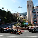 MONTE-CARLO, MONACO - MAY 26: George Russell of Great Britain driving the (63) Mercedes AMG Petronas F1 Team W15 leads Max Verstappen of the Netherlands driving the (1) Oracle Red Bull Racing RB20 on track during the F1 Grand Prix of Monaco at Circuit de Monaco on May 26, 2024 in Monte-Carlo, Monaco. (Photo by Joe Portlock - Formula 1/Formula 1 via Getty Images)