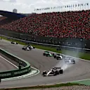 ZANDVOORT, NETHERLANDS - AUGUST 25: Lance Stroll of Canada driving the (18) Aston Martin AMR24 Mercedes leads Nico Hulkenberg of Germany driving the (27) Haas F1 VF-24 Ferrari during the F1 Grand Prix of Netherlands at Circuit Zandvoort on August 25, 2024 in Zandvoort, Netherlands. (Photo by Bryn Lennon - Formula 1/Formula 1 via Getty Images)