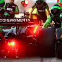 ABU DHABI, UNITED ARAB EMIRATES - DECEMBER 05: Nico Hulkenberg of Germany driving the (27) Kick Sauber C45 Ferrari makes a pitstop during practice ahead of the F1 Grand Prix of Abu Dhabi at Yas Marina Circuit on December 05, 2025 in Abu Dhabi, United Arab Emirates. (Photo by Peter Fox/Getty Images)
