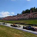 SPIELBERG, AUSTRIA - JUNE 29: Franco Colapinto of Argentina driving the (43) Alpine F1 A525 Renault leads Yuki Tsunoda of Japan driving the (22) Oracle Red Bull Racing RB21 and Lance Stroll of Canada driving the (18) Aston Martin F1 Team AMR25 Mercedes on track during the F1 Grand Prix of Austria at Red Bull Ring on June 29, 2025 in Spielberg, Austria. (Photo by Rudy Carezzevoli/Getty Images)