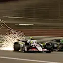 BAHRAIN, BAHRAIN - APRIL 13: Sparks fly behind from Oliver Bearman of Great Britain driving the (87) Haas F1 VF-25 Ferrari as he passes Nico Hulkenberg of Germany driving the (27) Kick Sauber C45 Ferrari on track during the F1 Grand Prix of Bahrain at Bahrain International Circuit on April 13, 2025 in Bahrain, Bahrain. (Photo by Mark Sutton - Formula 1/Formula 1 via Getty Images)