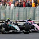 SPA, BELGIUM - JULY 27: Andrea Kimi Antonelli of Italy driving the (12) Mercedes AMG Petronas F1 Team W16 and Franco Colapinto of Argentina driving the (43) Alpine F1 A525 Renault battle for track position on track during the F1 Grand Prix of Belgium at Circuit de Spa-Francorchamps on July 27, 2025 in Spa, Belgium. (Photo by Ryan Pierse/Getty Images)