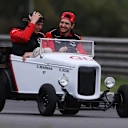 SAO PAULO, BRAZIL - NOVEMBER 09: Oliver Bearman of Great Britain and Haas F1 and Esteban Ocon of France and Haas F1 on the drivers parade prior to the F1 Grand Prix of Brazil at Autodromo Jose Carlos Pace on November 09, 2025 in Sao Paulo, Brazil. (Photo by Lars Baron/Getty Images)