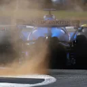 NORTHAMPTON, ENGLAND - JULY 04: Alexander Albon of Thailand driving the (23) Williams FW47 Mercedes kicks up gravel on track during practice ahead of the F1 Grand Prix of Great Britain at Silverstone Circuit on July 04, 2025 in Northampton, England. (Photo by Bryn Lennon - Formula 1/Formula 1 via Getty Images)