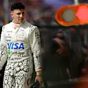NORTHAMPTON, ENGLAND - JULY 05: Thirteenth placed qualifier Isack Hadjar of France and Visa Cash App Racing Bulls walks in the Pitlane during qualifying ahead of the F1 Grand Prix of Great Britain at Silverstone Circuit on July 05, 2025 in Northampton, England. (Photo by Mario Renzi - Formula 1/Formula 1 via Getty Images)