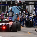 BUDAPEST, HUNGARY - AUGUST 03: Isack Hadjar of France driving the (6) Visa Cash App Racing Bulls VCARB 02 makes a pitstop during the F1 Grand Prix of Hungary at Hungaroring on August 03, 2025 in Budapest, Hungary. (Photo by Mark Thompson/Getty Images)