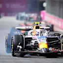 LAS VEGAS, NEVADA - NOVEMBER 22: Liam Lawson of New Zealand driving the (30) Visa Cash App Racing Bulls VCARB 02 on track with damage during the F1 Grand Prix of Las Vegas at Las Vegas Strip Circuit on November 22, 2025 in Las Vegas, Nevada. (Photo by Hector Vivas/Getty Images)