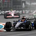 MIAMI, FLORIDA - MAY 03: Alexander Albon of Thailand driving the (23) Williams FW47 Mercedes leads Fernando Alonso of Spain driving the (14) Aston Martin F1 Team AMR25 Mercedes and Liam Lawson of New Zealand driving the (30) Visa Cash App Racing Bulls VCARB 02 on track during the Sprint ahead of the F1 Grand Prix of Miami at Miami International Autodrome on May 03, 2025 in Miami, Florida. (Photo by Rudy Carezzevoli/Getty Images)
