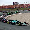 ZANDVOORT, NETHERLANDS - AUGUST 31: Fernando Alonso of Spain driving the (14) Aston Martin F1 Team AMR25 Mercedes leads Pierre Gasly of France driving the (10) Alpine F1 A525 Renault on track during the F1 Grand Prix of Netherlands at Circuit Zandvoort on August 31, 2025 in Zandvoort, Netherlands. (Photo by Joe Portlock/Getty Images)